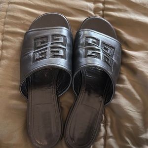 GIVENCHY
Logo-embossed leather sandals